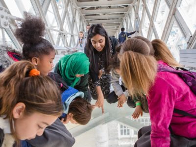 School pupils visiting Tower Bridge & experiencing the views from the glass floor
